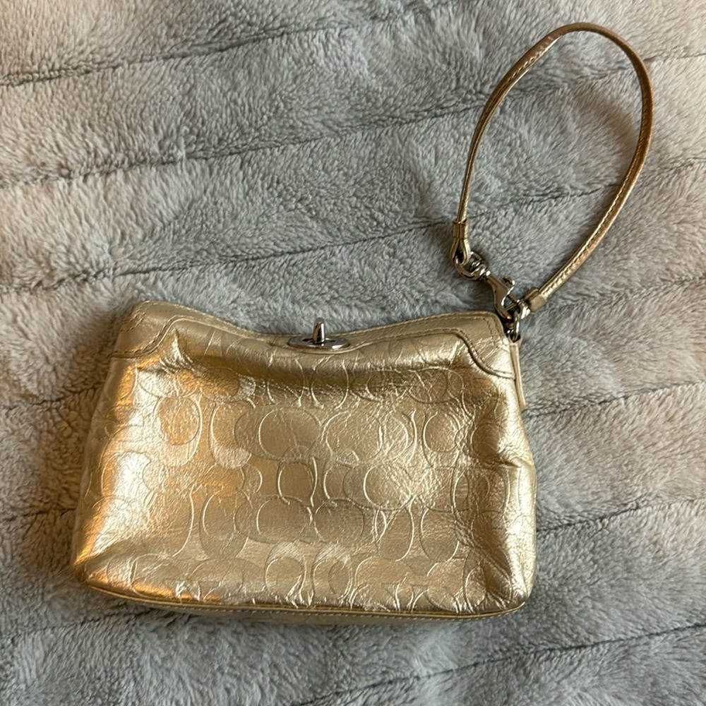 Coach Gold tones wristlet